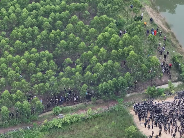 a drone view shows thai soldiers and riot police officers confronting cambodian people in a disputed village along the thailand cambodia border in sa kaeo province thailand september 17 photo reuters