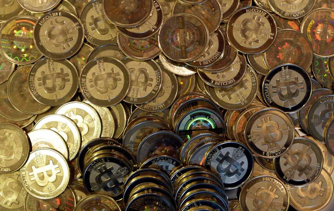 This file photo shows bitcoin tokens in Sandy, Utah.