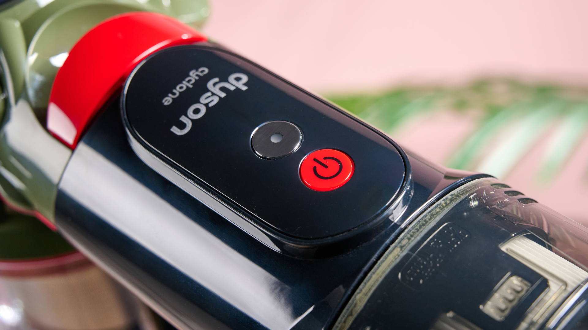 Close up of power and mode buttons on Dyson V8 Cyclone